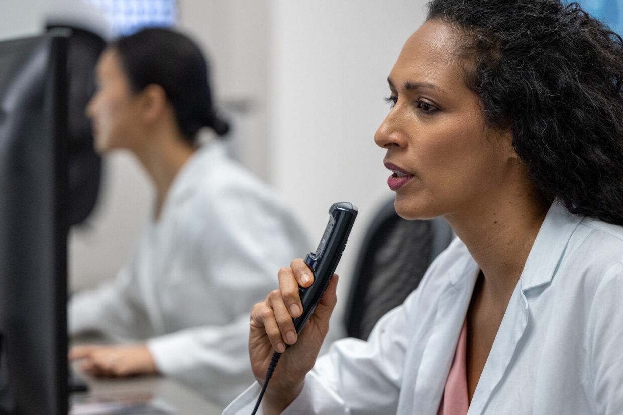 Female-radiologist-dictation-recorder-looking-at-MRI-scan_iStock-1326241059-1-e1703008102396